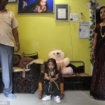 The 18-year-old sits at home in Nagpur, India, in front of a pink teddy bear which looms over her tiny frame