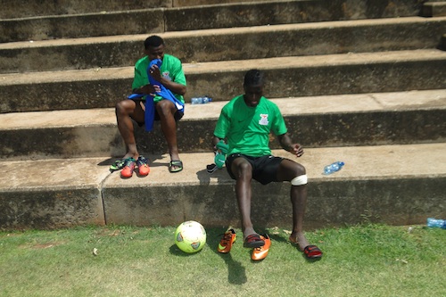 EASY DOES IT. Chisamba Lungu and Christopher Katongo on the sidelines.